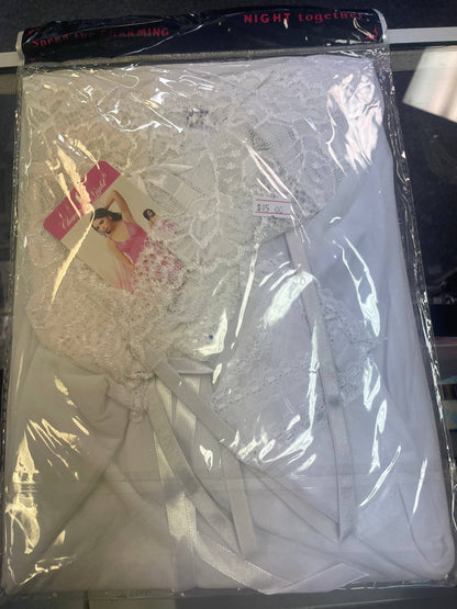 a package of white lingerie with a picture of a woman on it