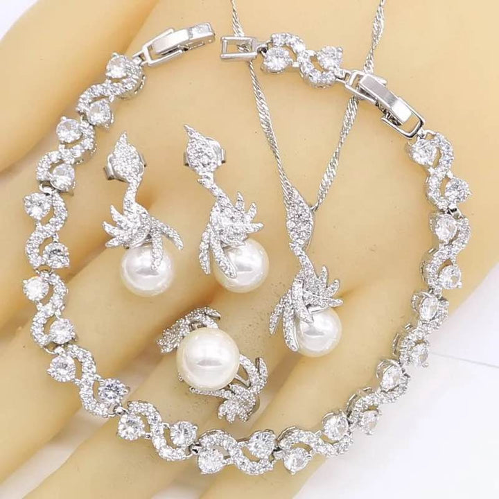Jewelry set.   White pearls jewelry with zircon bracelet, white gold plated necklace, earrings and ring size 6